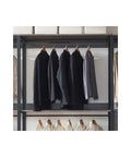 Top Shelf Wood Walk In Closet Organizer System Featuring Straight Up Customizable Shelves Heavy Duty Hanging Rods And Hassle Free Drawers For Bedroom Storage That Honestly Maximizes Space with hanging jackets.