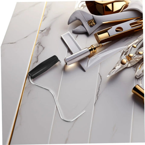 Tent Stake Puller Tool For Camping Peg Remover And Extractor, showing lightweight, portable design on marble surface.