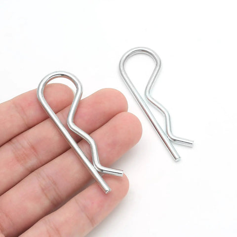 20 Pack R Clips Hitch Pins For Trailers Stainless Steel M3 By 60mm Retaining Cotter Pins, close-up showing hand holding clips
