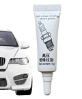 Dielectric Lubricant For Electronics And Automotive Weatherproof Silicone Grease High Temperature Insulating Compound Anti Corrosion Sealant For Spark Plugs And Ignition Systems Keeps Electrical Contacts Smooth And Protected No Fuss, 5g tube next to a car