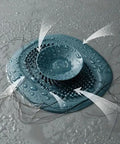 Kick Those Dreadful Sink Clogs To The Curb With This Blue Bathroom Drain Hair Catcher, Irregular Pattern Strainer Filter, And Sturdy Bath Stopper Plug For Modern Homes, showing water and hair collection.