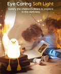 Children reading with Squishy Duck Night Light For Kids With Soft Warm Glow Silicone Dimmable Nursery Lamp Rechargeable LED Battery