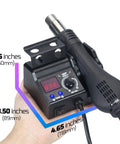 Compact Hot Air Rework Station Kit With Integrated Nozzle Holder, 3 Nozzles And 2 Tweezers, Adjustable Temperature And Air Volume shown in hand