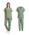 Unisex Medical Scrubs Set With Jogger Pants And Multi Pocket Top in matcha green, made of breathable moisture wicking fabric.