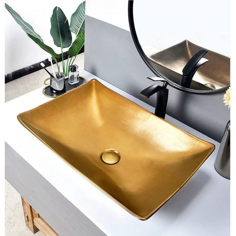 Next Level Golden Ceramic Vessel Sink For Above Counter Bathroom Vanity, Killer Artistic Wash Basin With Sleek Black Faucet And Pop Up Drain, Slick High Gloss Porcelain Bowl, Absolute Stunner, Zero Hassle Setup displayed on a countertop.