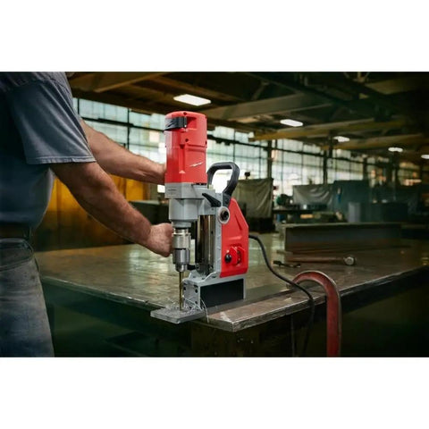 Milwaukee Style 1-5/8 Inch Auto Stop Electromagnetic Drill Kit with powerful 13 Amp motor in action on steel plate