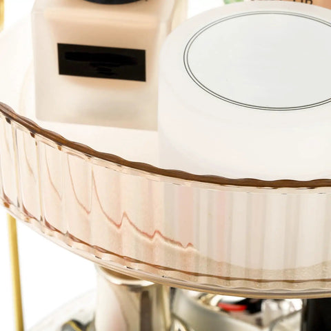 Close-up of 360 Smooth Spin 3 Tier Makeup Organizer For Bathroom Counter or Vanity Styling showcasing the top tier with skincare products.