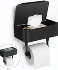 Wall mounted Stainless Steel Toilet Paper Holder With Shelf And Hidden Wipes Dispenser SUS304 showcasing tissues and phone storage.