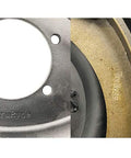 TruRyde self-adjusting electric brake assembly for trailer axles, front view showing backing plate and gold brake shoe