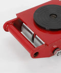 Built Different Heavy Duty Machinery Mover 13200 Lb Capacity Dolly Skateboard With 6 Ton Steel Wheels 360 Swivel Spin close-up of red dolly wheel.