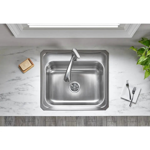 Overhead view of kitchen sink with Deluxe 3-1/2 Inch Sink Drain With Durable Type 304 Stainless Steel Body, strainer, rubber seal.