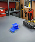 4 Piece Auto Dent Repair Kit With Plastic And Metal Puller Tabs For Damage Free Paint Safe Body Repair on workbench