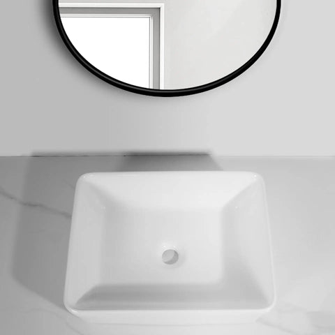 Top view of USZWBY Vessel Sinks Bathroom Vessel Sink Hotel Apartment Square Ceramic Wash Basin Home Art Table Bathroom Bowl Sink on marble countertop with mirror.