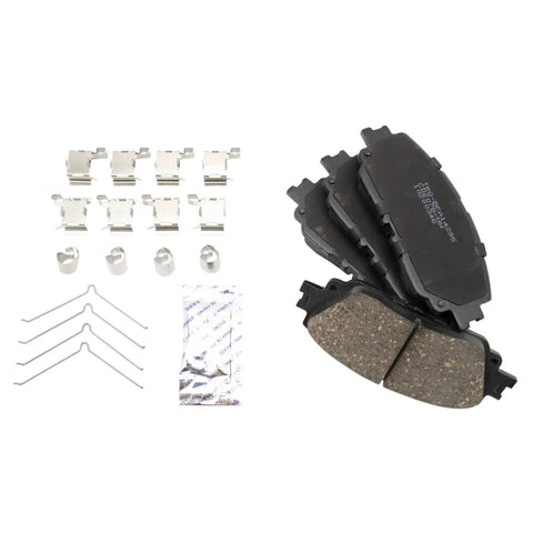 Front And Rear Ceramic Brake Pad Set With Hardware For Toyota, includes pads and mounting components on white background.