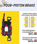Front view of Hycline four-piston e-bike hydraulic brake caliper in black with mounting lugs