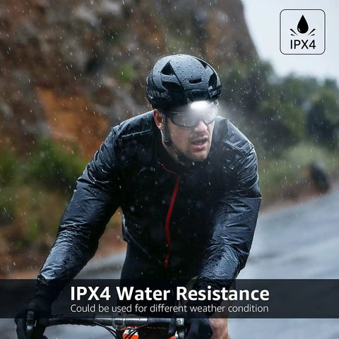 Cyclist in rain using Super Bright Led Headlamp Two Pack With Awesome Lighting Modes Waterproof And Lightweight Battery Powered Headlight