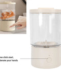Portable Mini Washing Machine 1.6L Rechargeable Cordless Foldable Design, user pressing button to start washing.