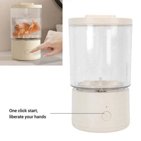 Portable Mini Washing Machine 1.6L Rechargeable Cordless Foldable Design, user pressing button to start washing.