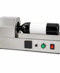 Compact Electric Heat Shrink Machine For Wine Bottle Neck Sleeves, stainless steel with a black bottle in position for sealing.