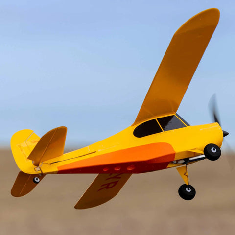 Champ Anniversary Edition 515mm RC Trainer Airplane BNF Basic With Safe Select Ready To Fly Factory Preassembled, flying in the sky