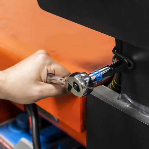 Hand using Three Eighths Inch Drive Ratchet And Socket Set on machinery, chrome vanadium steel, heavy duty auto repair and DIY wrench kit.
