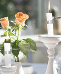 Automatic Candle Extinguisher Timer Kit With Self Extinguishing Tech For Cozy Home Vibes And Chill Lighting Easy Install Solid 4 Piece Gift Set in use with white candle and pink roses.