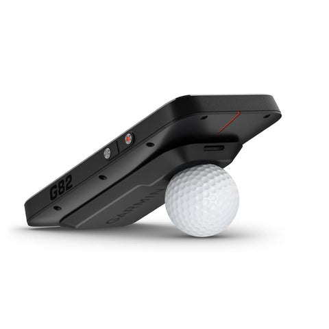 G82 Golf Launch Monitor With Premium GPS Handheld And Virtual Caddie 5 Inch Touchscreen standing on a golf ball