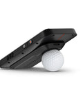 Approach G82 Launch Monitor And GPS Golf Handheld with 5 inch touchscreen angled with golf ball and built-in radar.