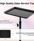 Adjustable Height Rolling Salon Cart With Tray On Durable Wheels For Tattoo Parlors Spas Dental Clinics And Hair Stylists Built From Corrosion Resistant Iron And Aluminum Anti Tip Design Lockable Casters Stable Mobile Workspace Black, shown with a close-up of the smooth black metal tray.