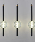 Black Modern Pendant Light Fixtures Set Of 3 Dimmable LED Mini Pendants With Crystal Accents, adjustable cords, against gray background