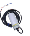 E2K C25MY1 AC Two Wire NO Capacitive Proximity Sensor, adjustable sensitivity, plug and play switch with coiled black cable