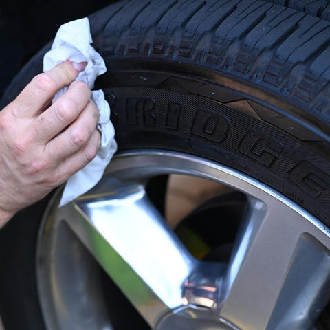 AutoSCRUB Cleaning Wipes Heavy Duty 60 Count Cleaning Cloths 15 By 10 Inches used on tire to remove road grime.