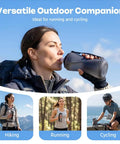 Woman hiking with collapsible silicone handheld water bottle with ergonomic strap 350ml blue hydration flask for running on-the-go