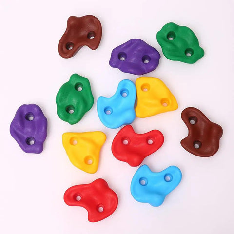 Colorful resin holds from the 18 Piece Tree Climbing Holds Set With Six Ten Foot Ratchet Straps For Outdoor Tree Climbing Kit Ideal For Backyard Gyms Obstacle Courses And Nature Play
