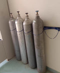 Heavy Duty Wall Mounted Gas Cylinder Rack With Adjustable Shelf For Labs, Durable Steel Oxygen Tank Holder securing four cylinders