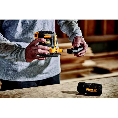 Man holding Cordless Quarter Sheet Sander Kit With Brushless Motor Variable Speed 8000 To 14000 OPM 20V Max XR 2.0Ah Battery