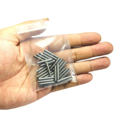 Knockout Quality Heavy Hitter 30 Pack 1/8 X 3/4 Inch Alloy Steel Dowel Pins in a hand-held bag.