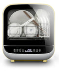 Portable Countertop Dishwasher Featuring No Fuss Quick Wash Cycles And Smart Energy Savers showing clean dishes and utensils in a steel tub.