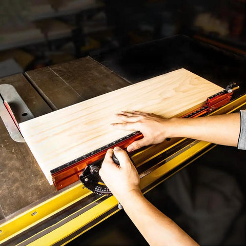 Next Level Miter Gauge with 22-to-36-Inch Extension Fence and 27 Positive Angle Stops enabling precise measurement on a wood table.