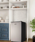 Solid 3.2 Cu Ft Upright Mini Freezer With No Stress Adjustable Thermostat And Removable Shelves For Dorm Office Kitchen Or Bedroom Smooth Chill Stash Setup In Fresh Silver in modern kitchen setting.