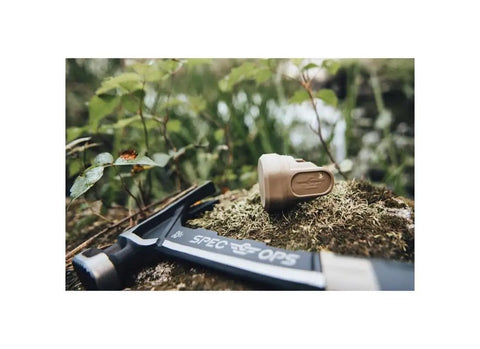 22 Oz Workhorse Framing Hammer With Magnetic Nail Starter and soft mallet cap on mossy surface outdoors