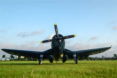 Front view of Six Channel RC Warbird Plane With 1700mm Wingspan F4U Corsair V3 PNP Kit on grass, four blade propeller visible.