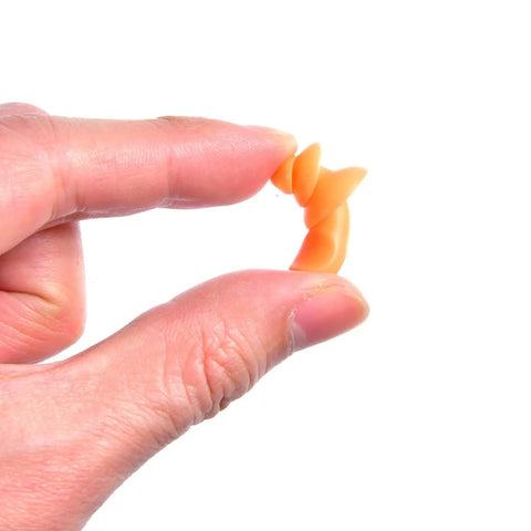 Close-up of hand holding orange earplug from Corded Sleep Ear Plugs Set With Flexible Cord, 20 Pairs Reusable Silicone.