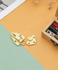 Six Pack Duckbill Hasp Locks Heavy Metal Toggle Latch Catches for Tool Boxes Trunks and Storage Units displayed on a colored surface.