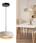 Modern Dome Yellow Travertine Pendant Light, Nordic Natural Stone Hanging Lamp over a dining table, soft light ambiance.