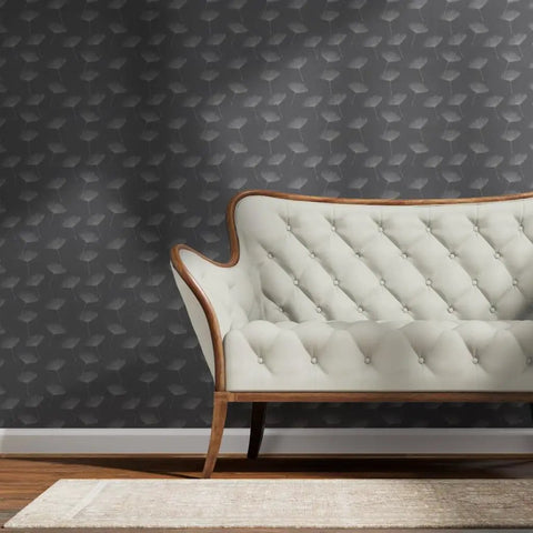 Gray Dandelion Silver Metallic Wallpaper Featuring Fibrous Texture And Eco Friendly PVC Free Finish Super Slick Paste The Wall Application For Totally Legit Chic Vibes behind a stylish white tufted loveseat.