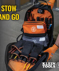 Open tool backpack with labeled compartments for organized storage, featuring orange and gray dual compartment tool pouch.