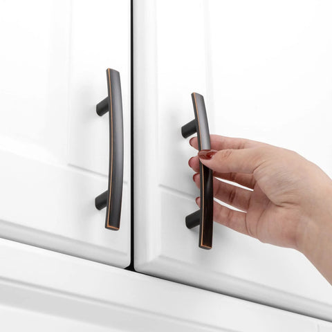 Hand installing 10 Pack 3 Inch Oil Rubbed Bronze Kitchen Cabinet Pulls With Smooth Rounded Edges Durable Solid Metal Hardware