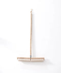 Heavy Duty Push Broom With Rock Solid Four Layer Stiff Plastic Bristles And A Beefy Wooden Handle, 82 cm long for outdoor cleanup.