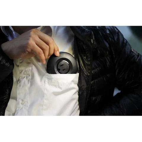 Person placing Donut Power Strip With Five Sockets And Two USB Ports, Space Saving Accessory, 1500 Watts At 240V in pocket